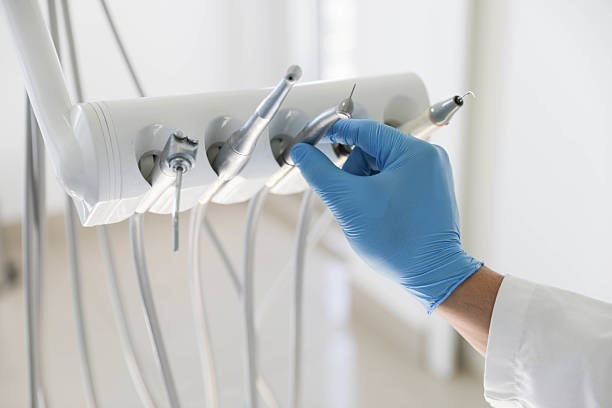 Professional Tooth Extraction technician working in Crawfordsville, IN